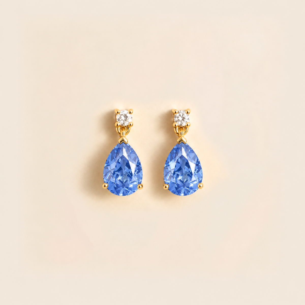 Pisa light blue sapphire and diamond pear drop earrings in gold