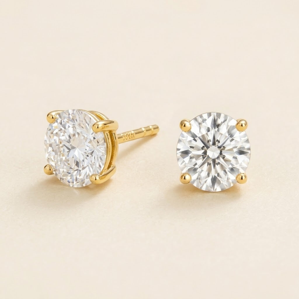 Nina round lab-grown diamond solitaire stud earrings in gold – angled view | Juvetti