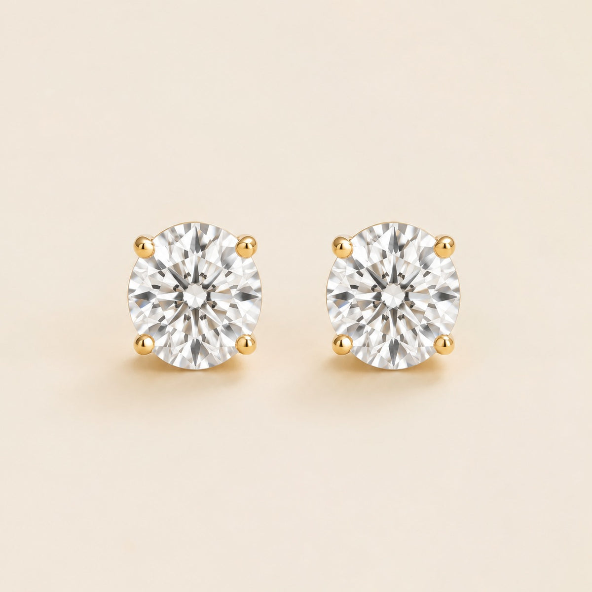 Nina round lab-grown diamond solitaire stud earrings in gold – front view | Juvetti