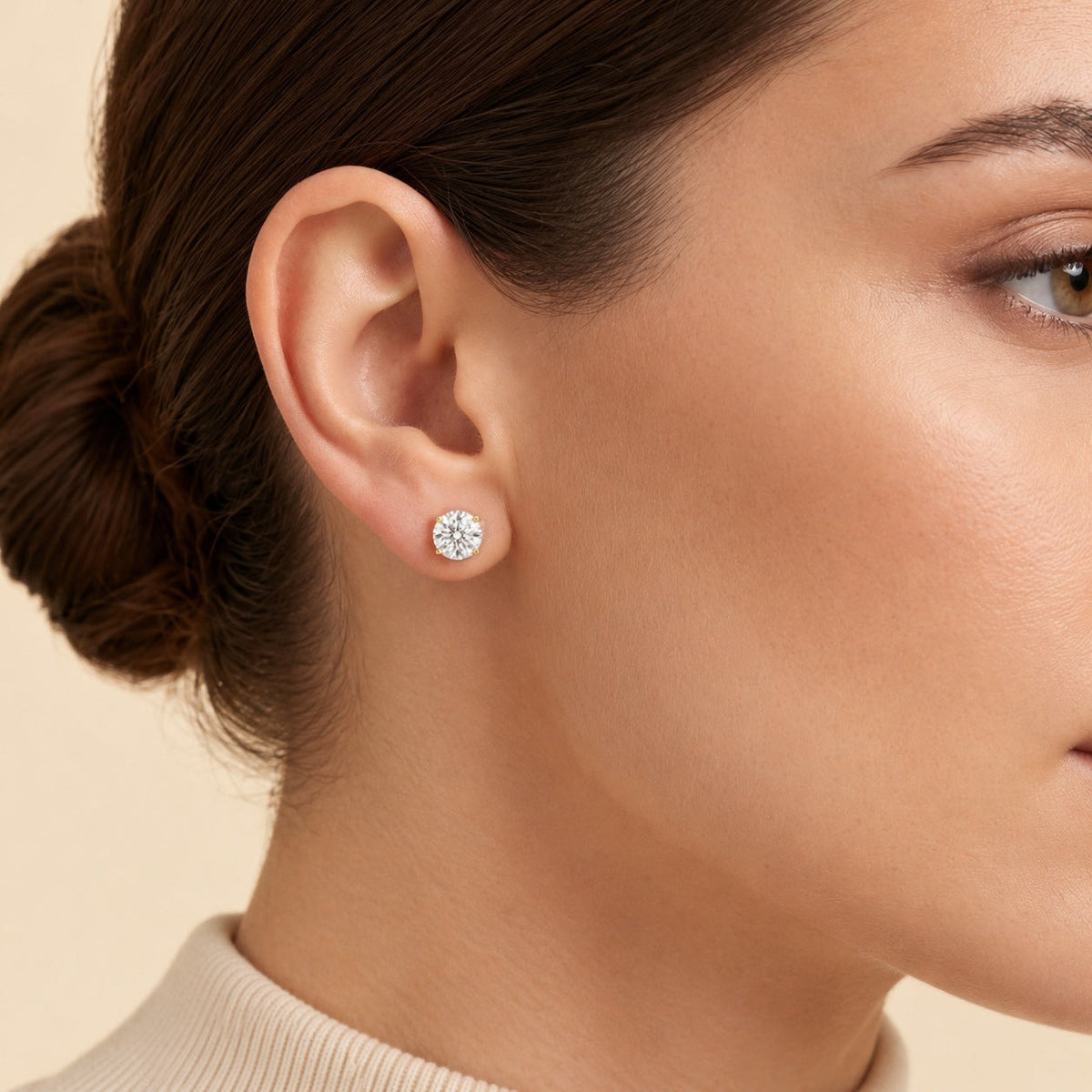 Nina round lab-grown diamond solitaire stud earrings in gold – on model | Juvetti