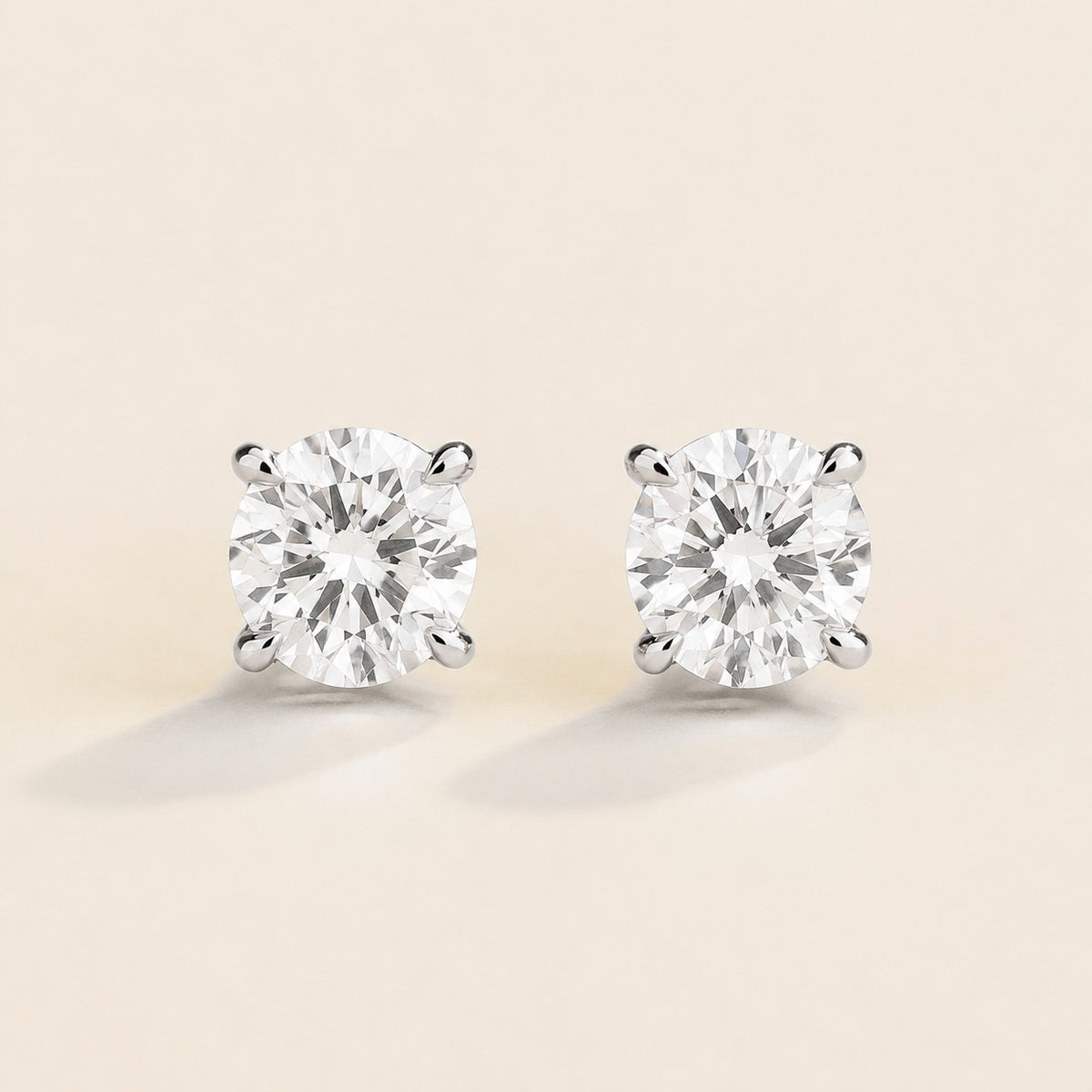 Nina round lab-grown diamond solitaire stud earrings in white gold – front view | Juvetti