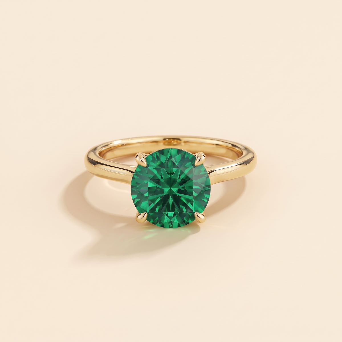 Nina Round Shape Emerald Cathedral Solitaire Ring in Gold, front view