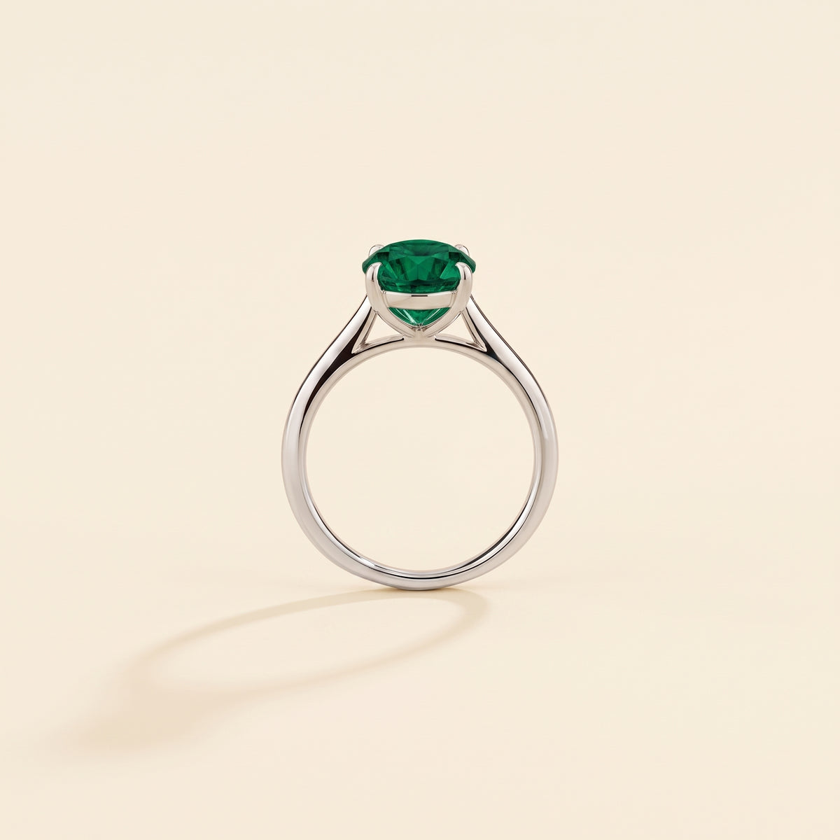Nina Round Shape Emerald Cathedral Solitaire Ring in White Gold, side profile view