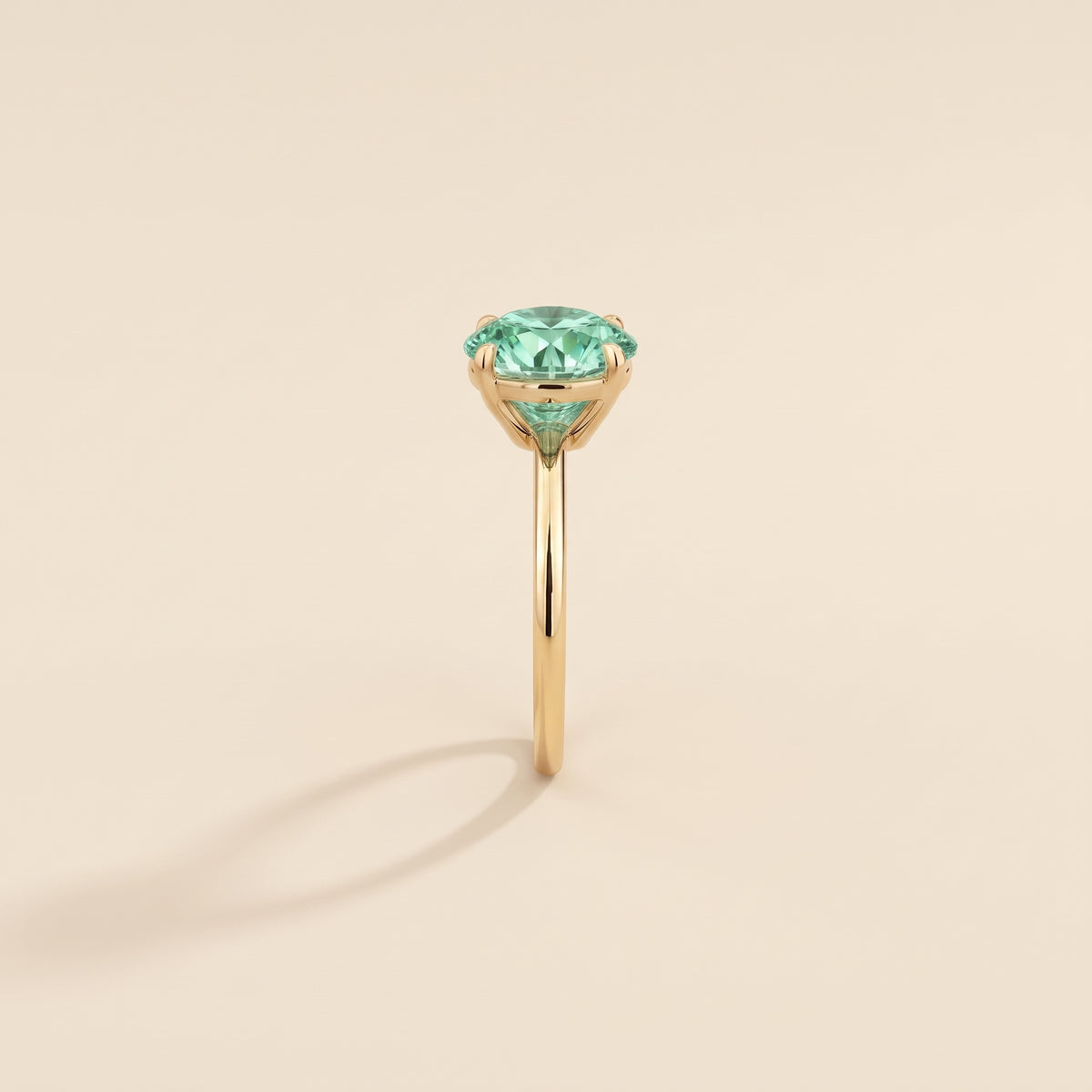 Nina Round Shape Green Sapphire Cathedral Solitaire Ring in Gold, side edge view