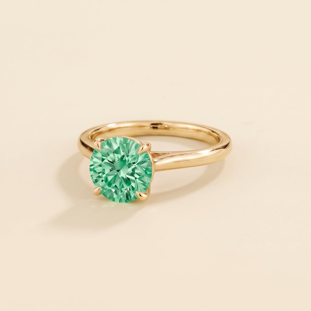 Nina Round Shape Green Sapphire Cathedral Solitaire Ring in Gold, three-quarter view