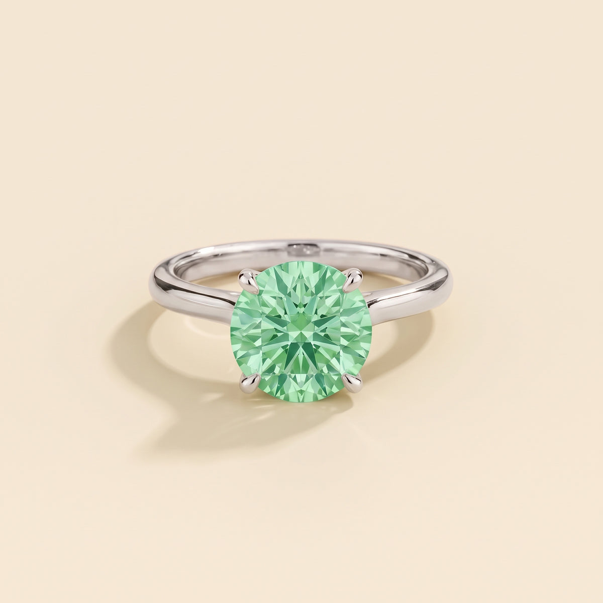 Nina Round Shape Green Sapphire Cathedral Solitaire Ring in White Gold, front view