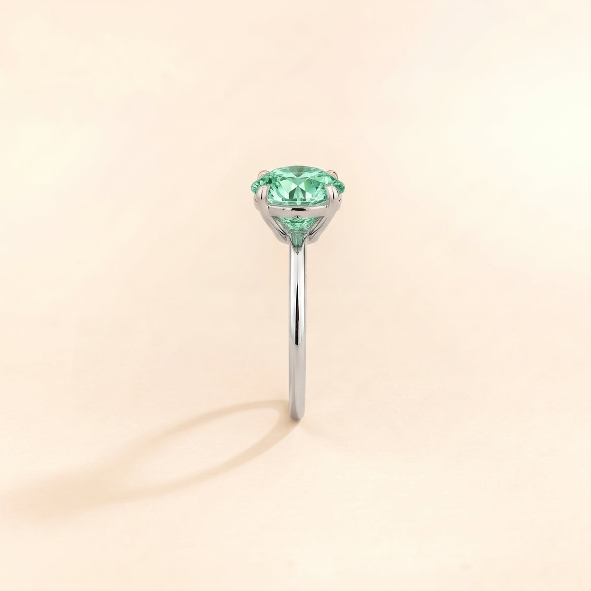 Nina Round Shape Green Sapphire Cathedral Solitaire Ring in White Gold, side edge view