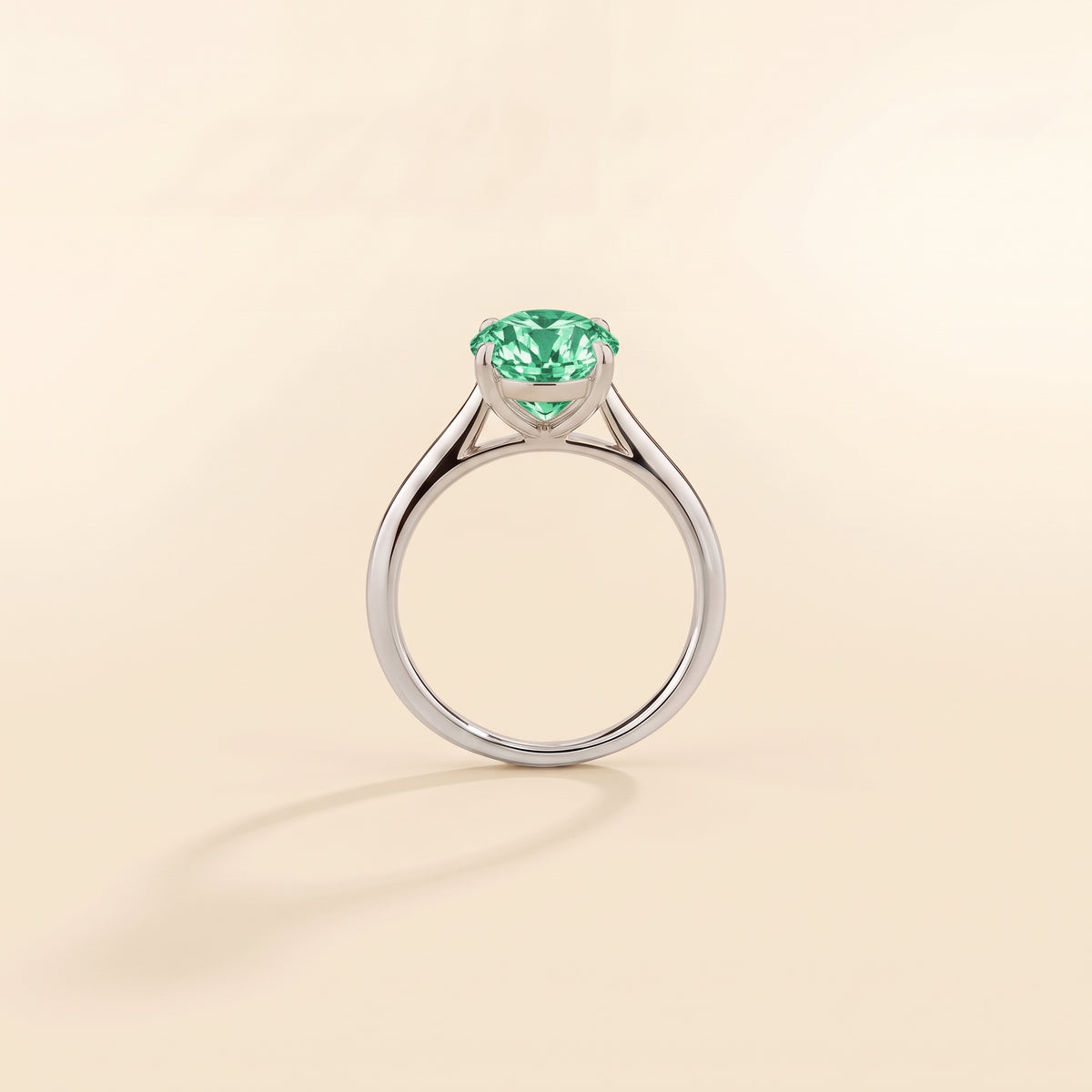Nina Round Shape Green Sapphire Cathedral Solitaire Ring in White Gold, side profile view