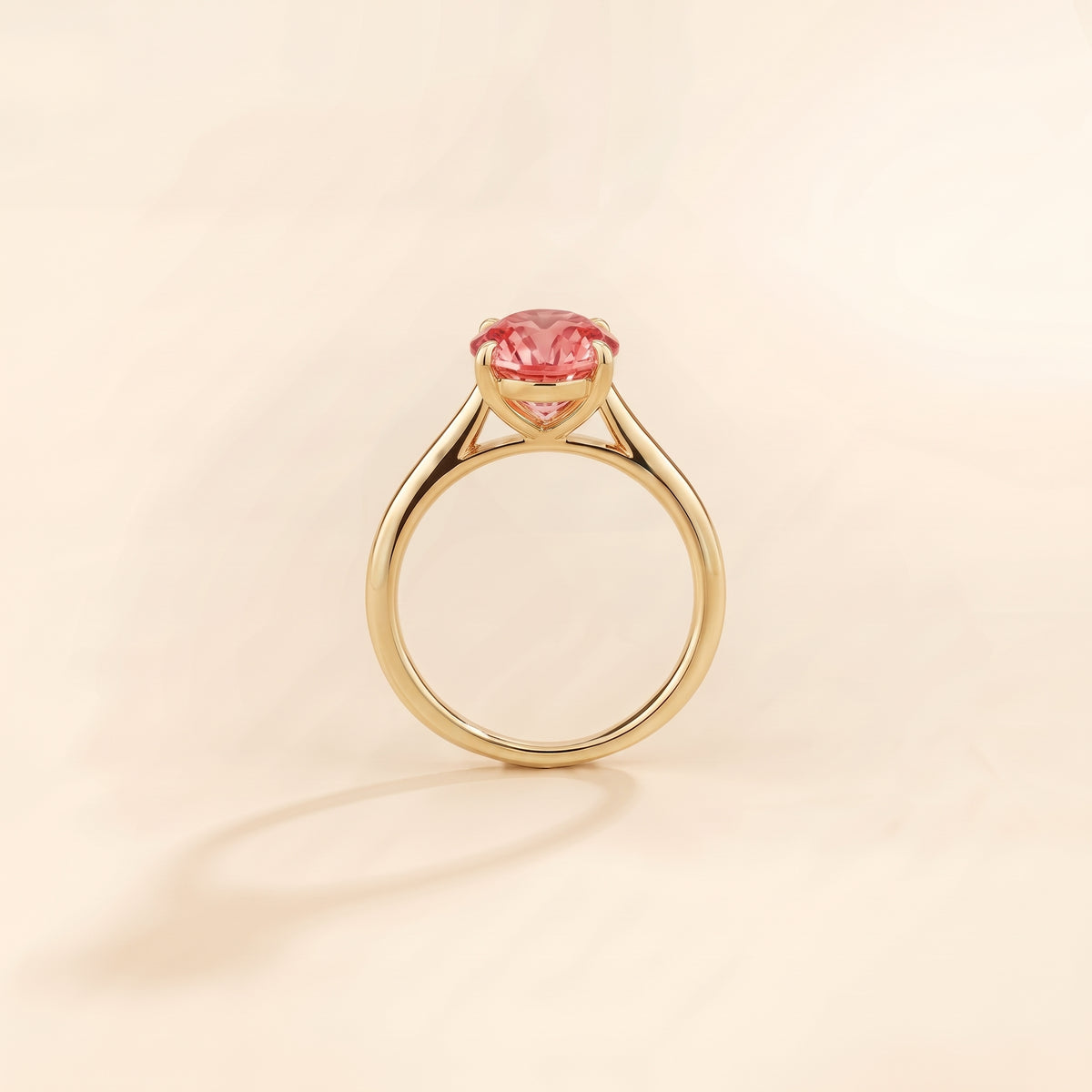 Nina Round Shape Padparadscha Sapphire Cathedral Solitaire Ring in Gold, side profile view