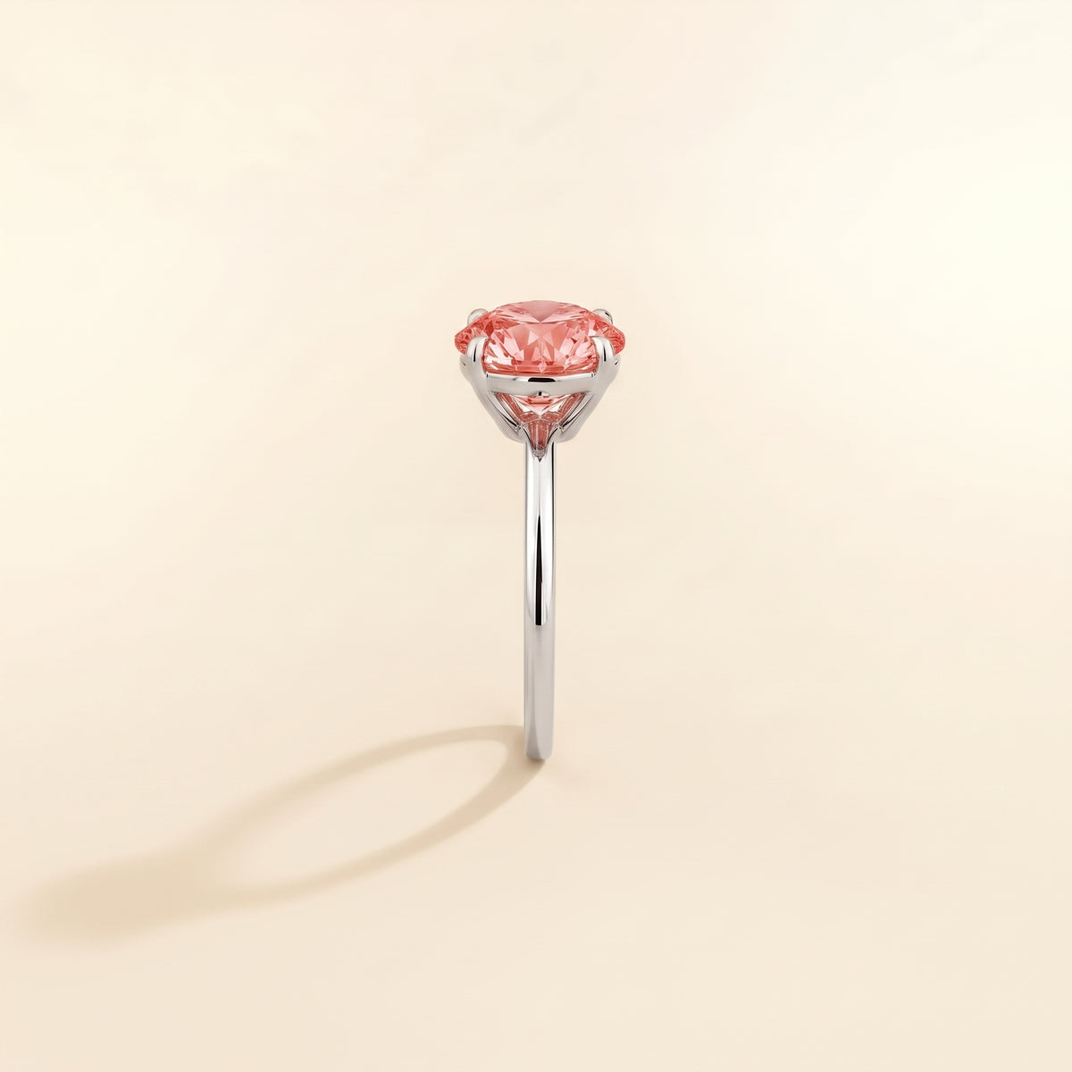 Nina Round Shape Padparadscha Sapphire Cathedral Solitaire Ring in White Gold, side edge view