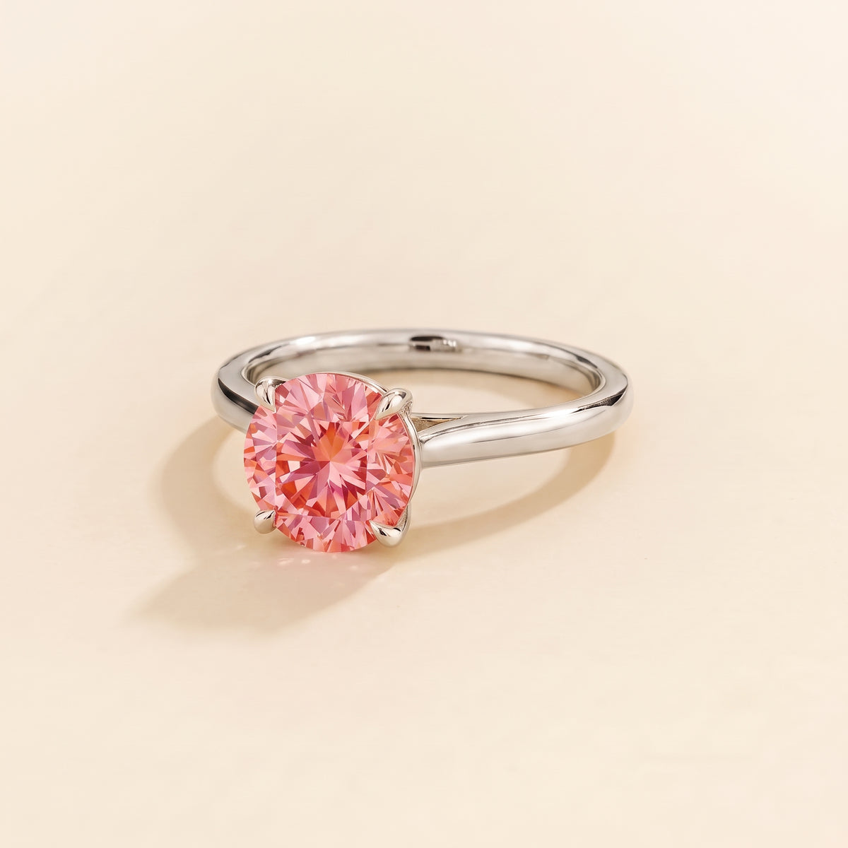 Nina Round Shape Padparadscha Sapphire Cathedral Solitaire Ring in White Gold, three-quarter view