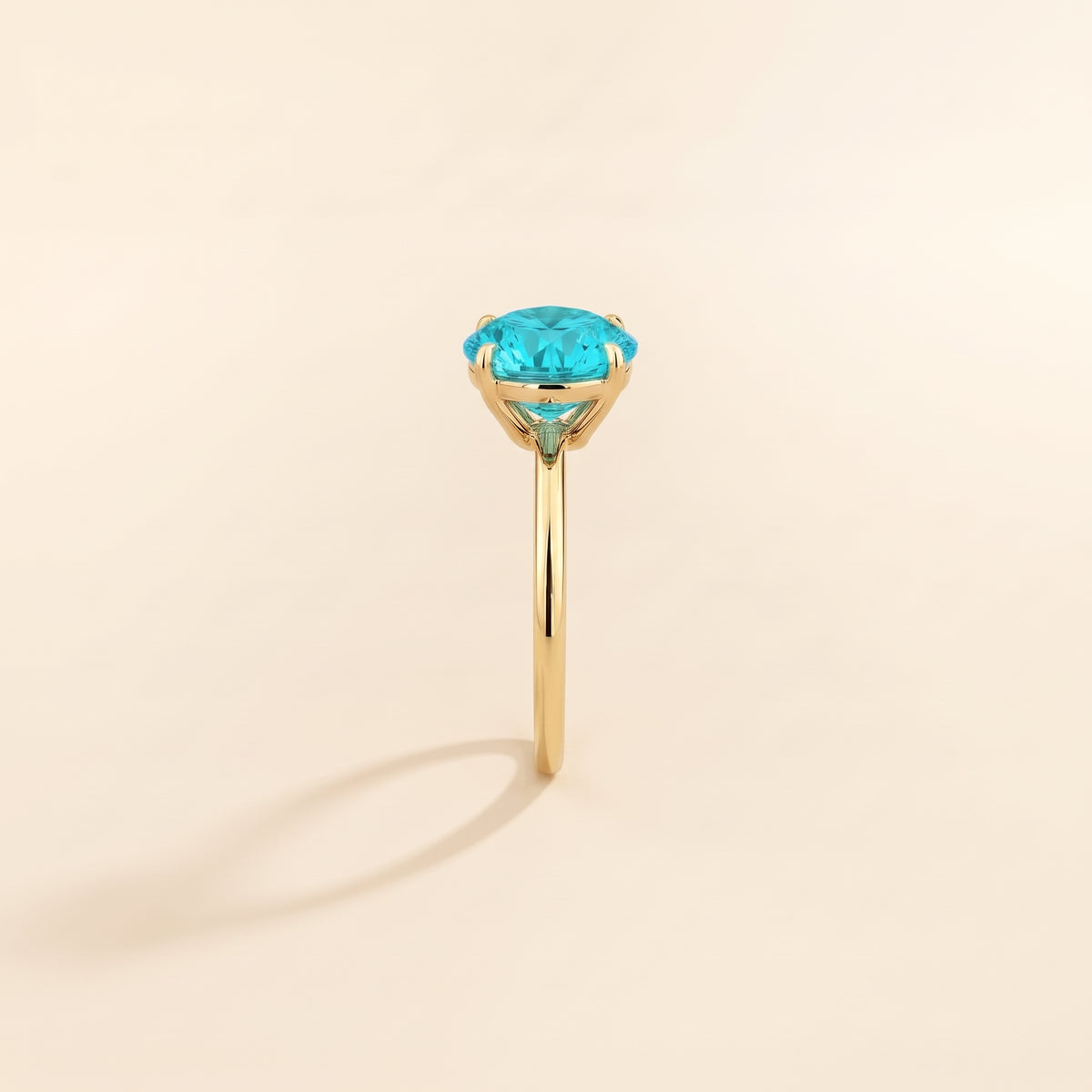Nina Round Shape Paraiba Sapphire Cathedral Solitaire Ring in Gold, side edge view