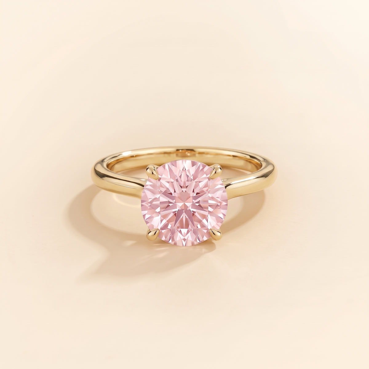 Nina Round Shape Pastel Pink Sapphire Cathedral Solitaire Ring in Gold, front view