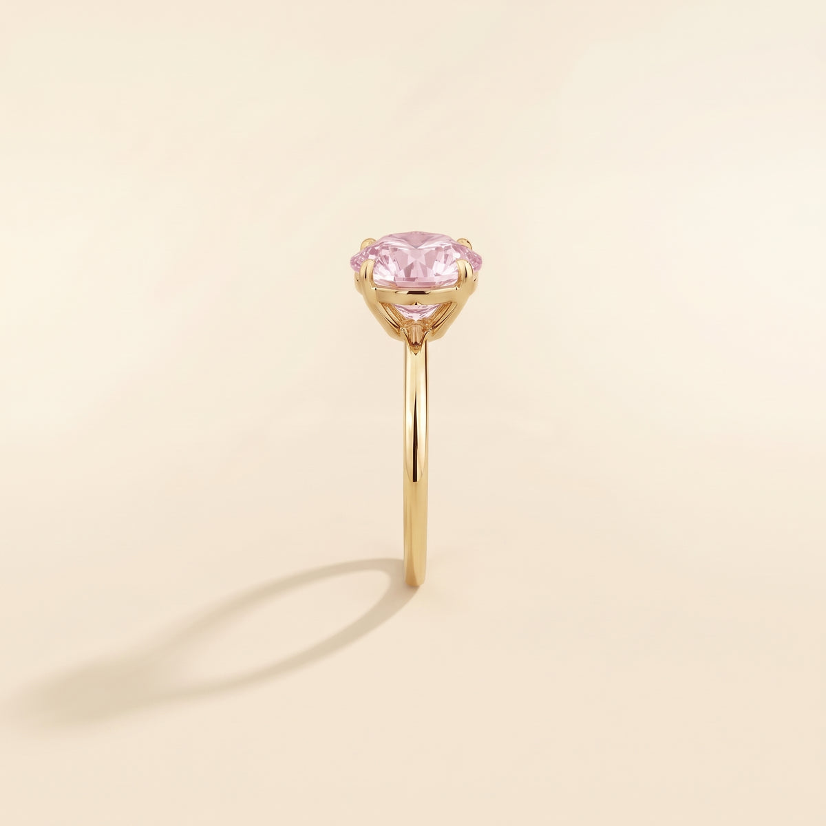 Nina Round Shape Pastel Pink Sapphire Cathedral Solitaire Ring in Gold, side edge view
