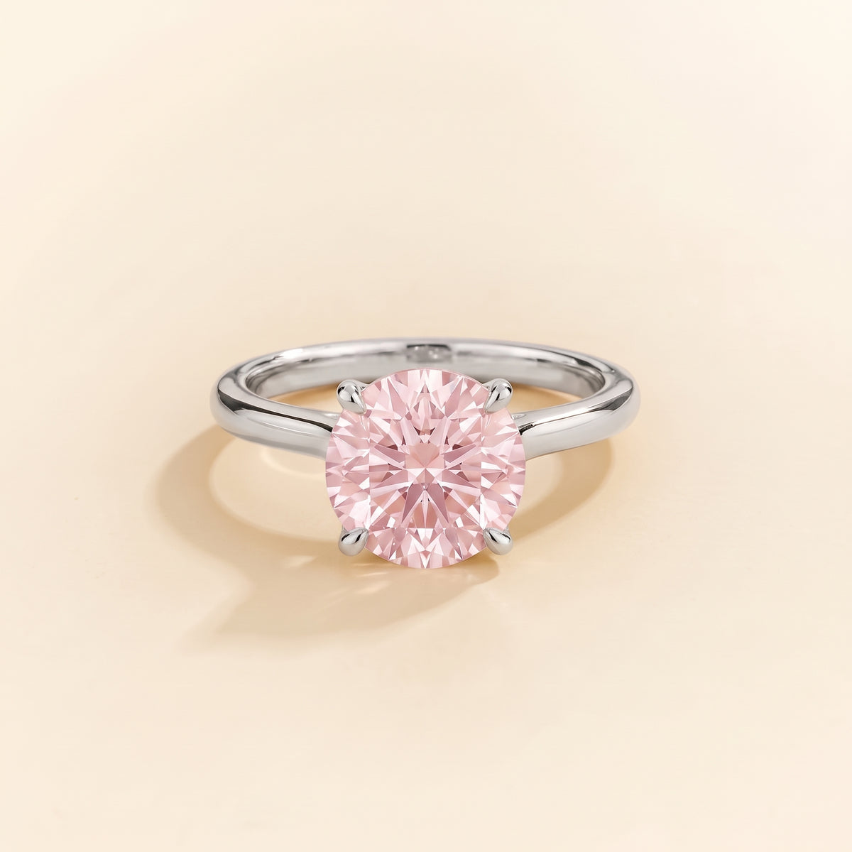 Nina Round Shape Pastel Pink Sapphire Cathedral Solitaire Ring in White Gold, front view
