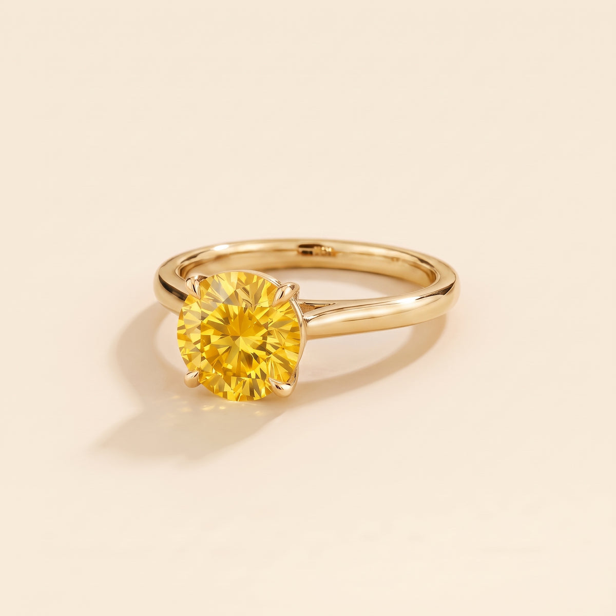 Nina Round Shape Yellow Sapphire Cathedral Solitaire Ring in Gold, three-quarter view