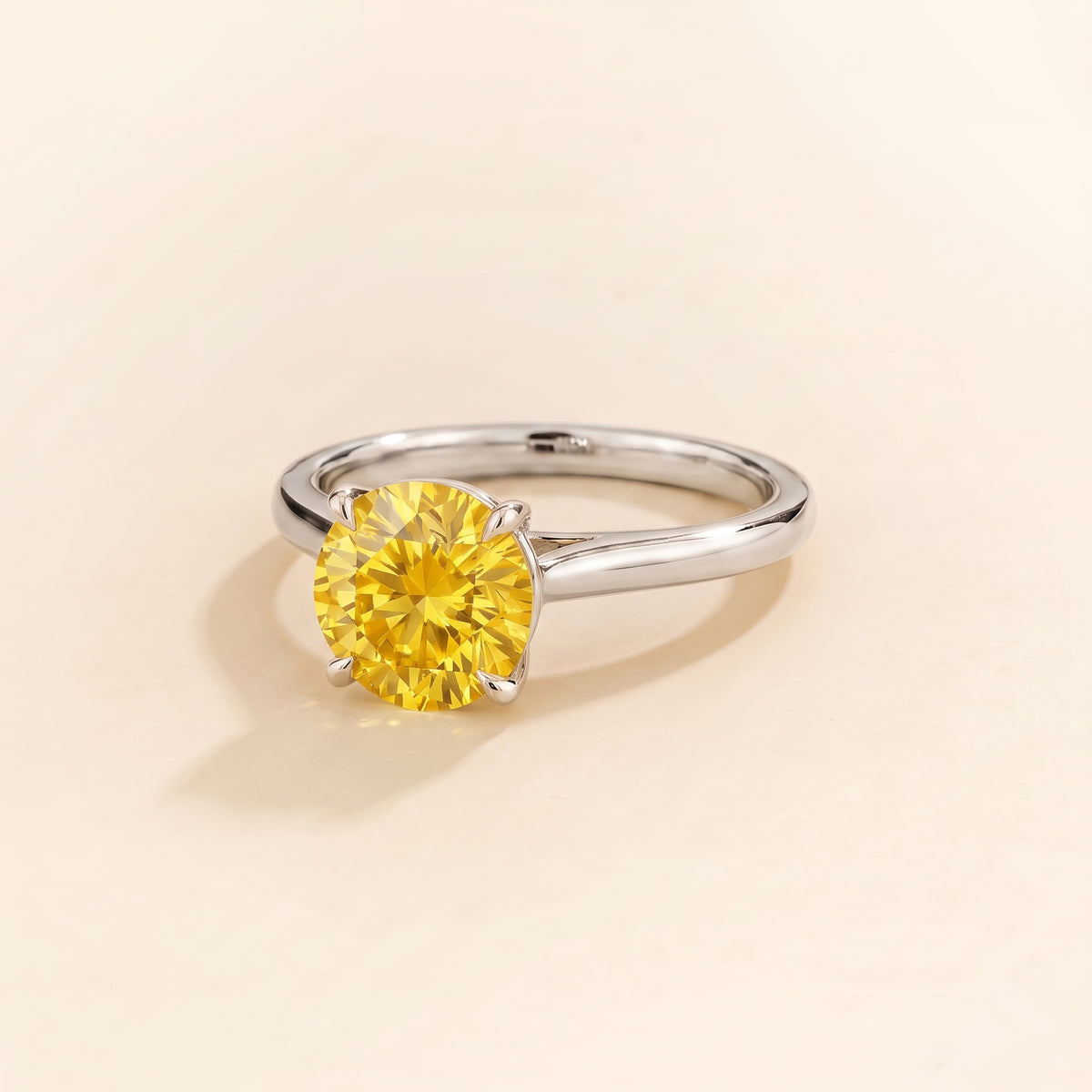 Nina Round Shape Yellow Sapphire Cathedral Solitaire Ring in White Gold, three-quarter view