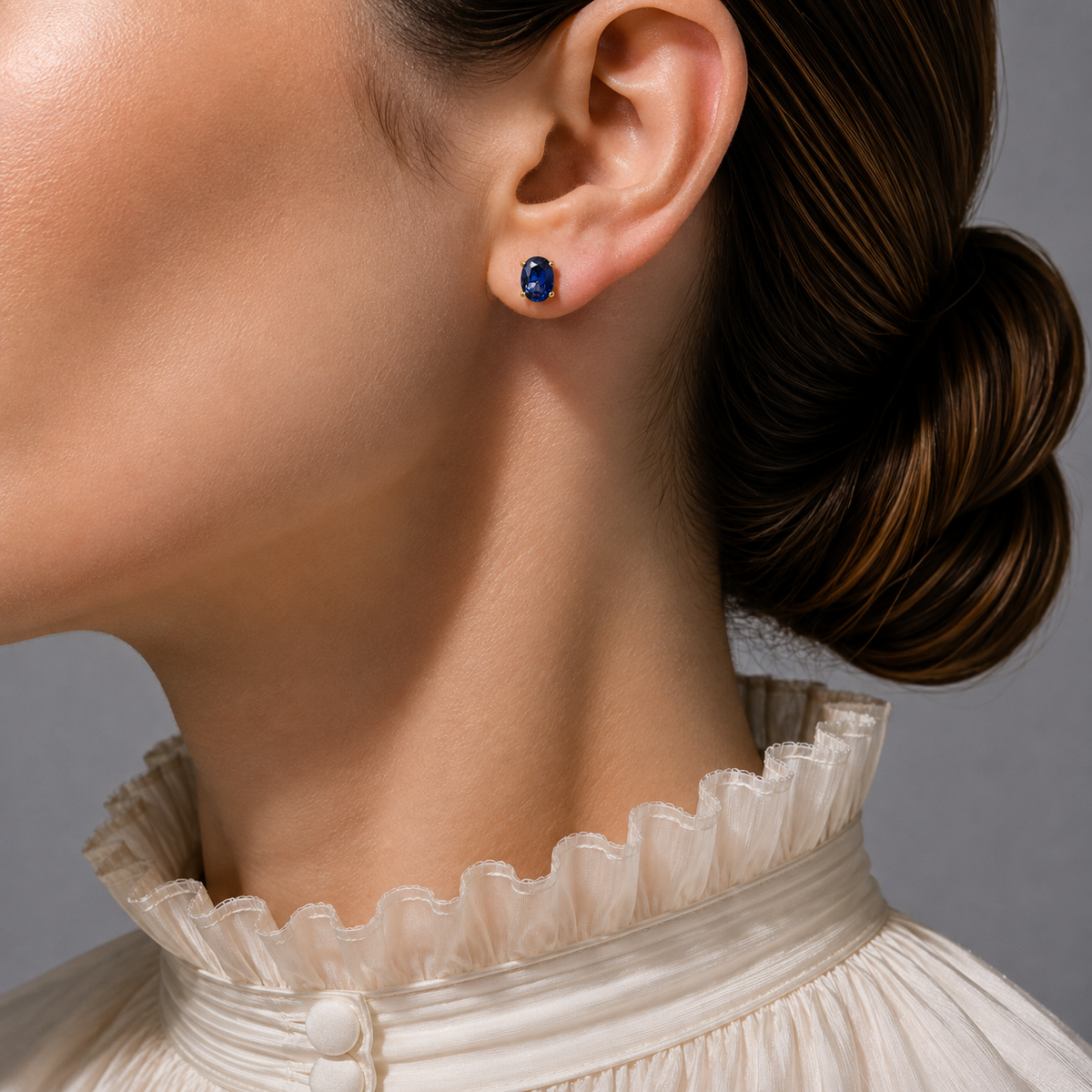 Ovo Blue Sapphire Oval Solitaire Stud Earrings in Gold