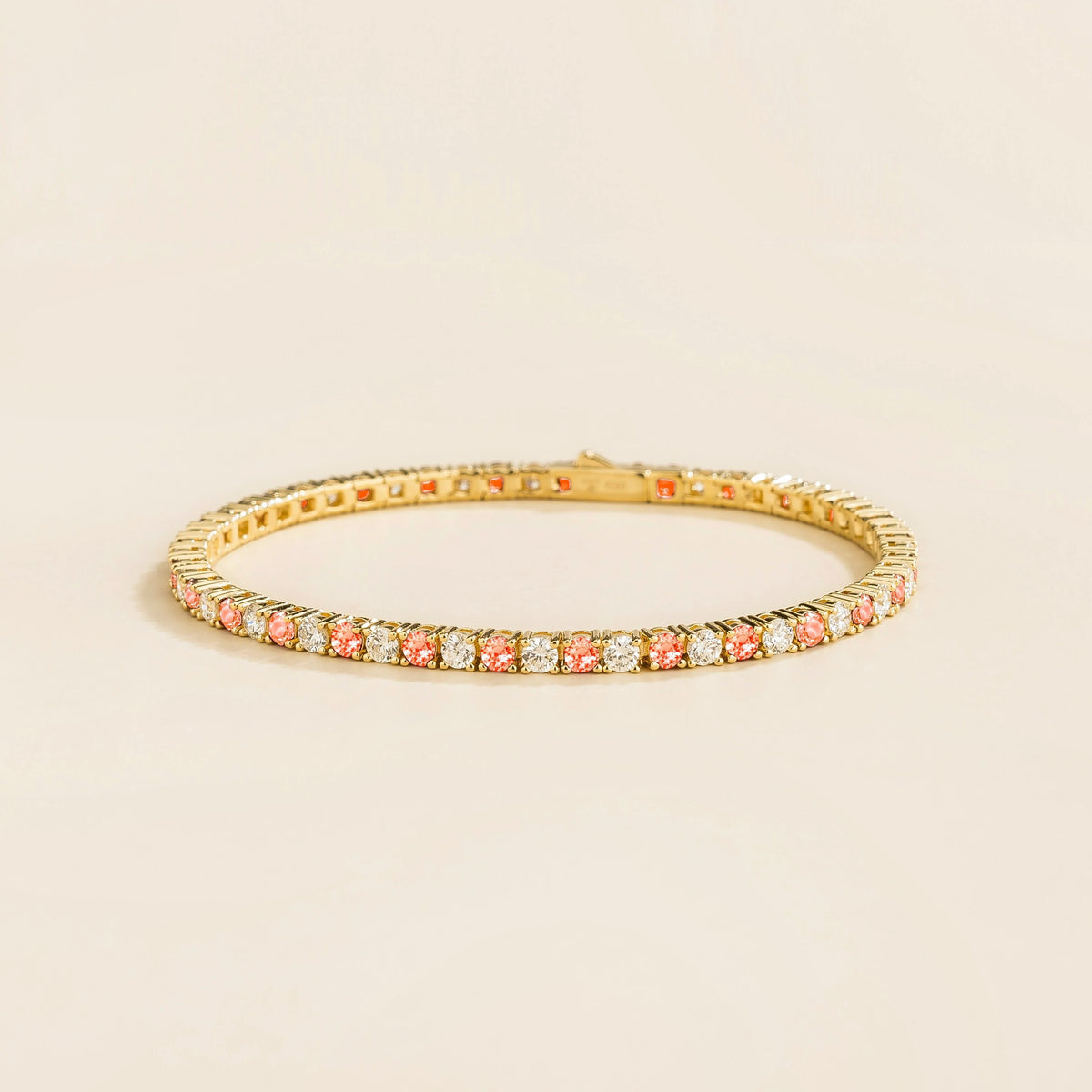 Stacy gold tennis bracelet with round padparadscha sapphire and lab grown diamonds