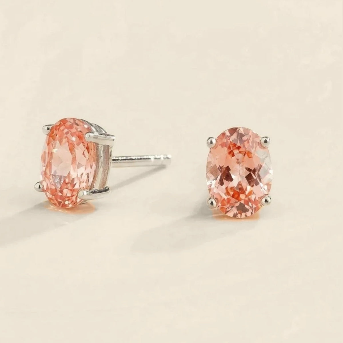 Ovo Padparadscha Sapphire Oval Stud Earrings in White Gold – angle view