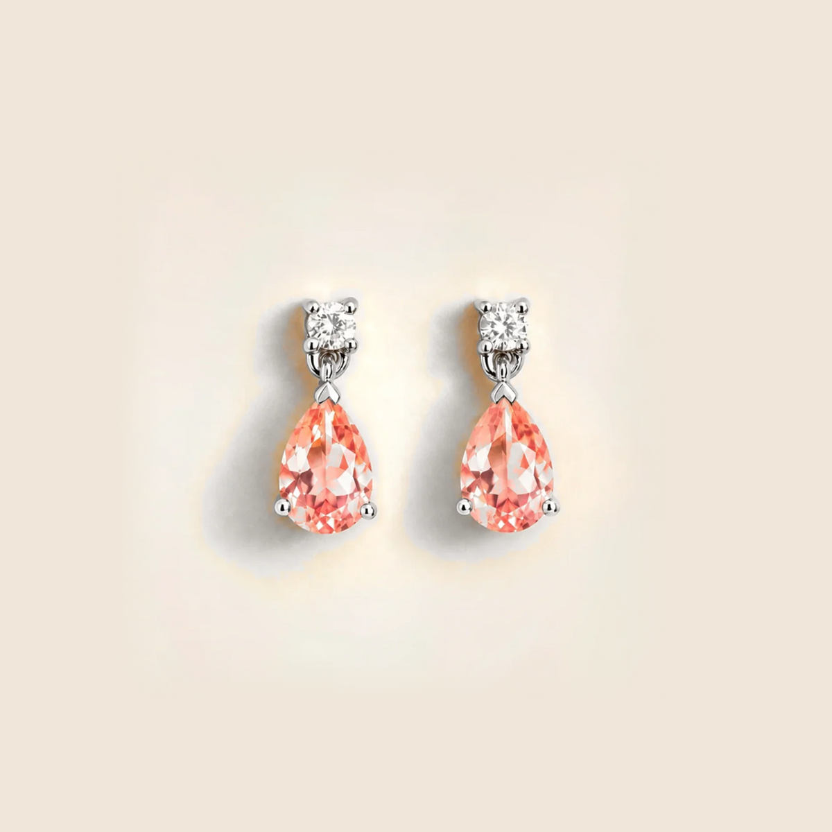 Lab-grown padparadscha sapphire and diamond pear drop earrings in white gold – front view | Pisa by Juvetti