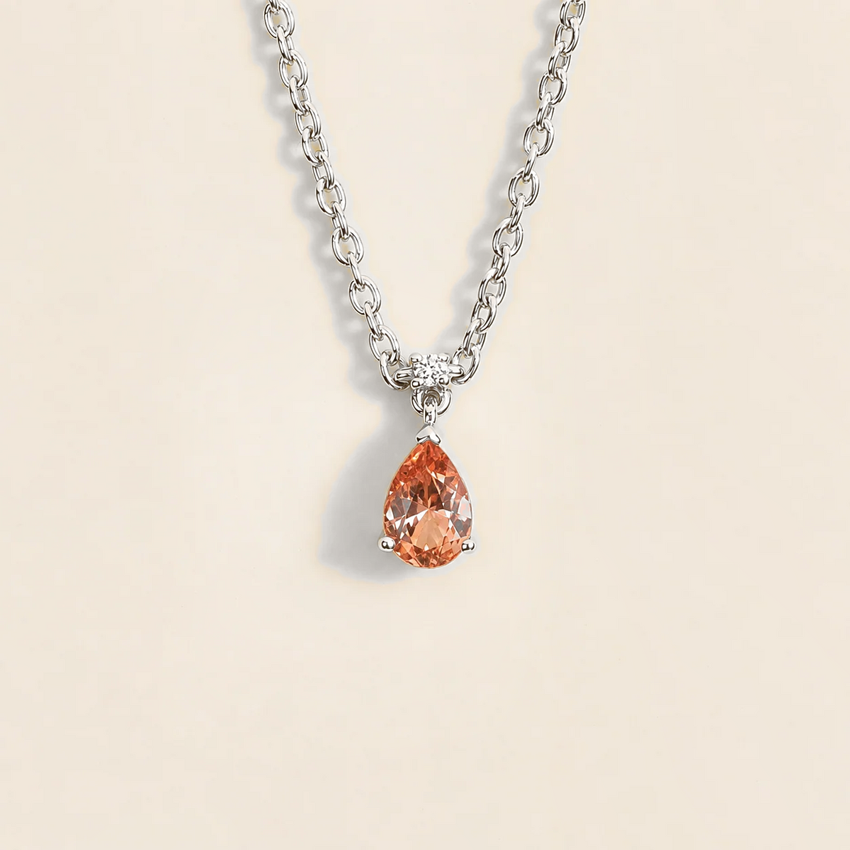Lab-grown padparadscha sapphire and diamond pear drop pendant necklace in white gold, small – front view | Pisa by Juvetti
