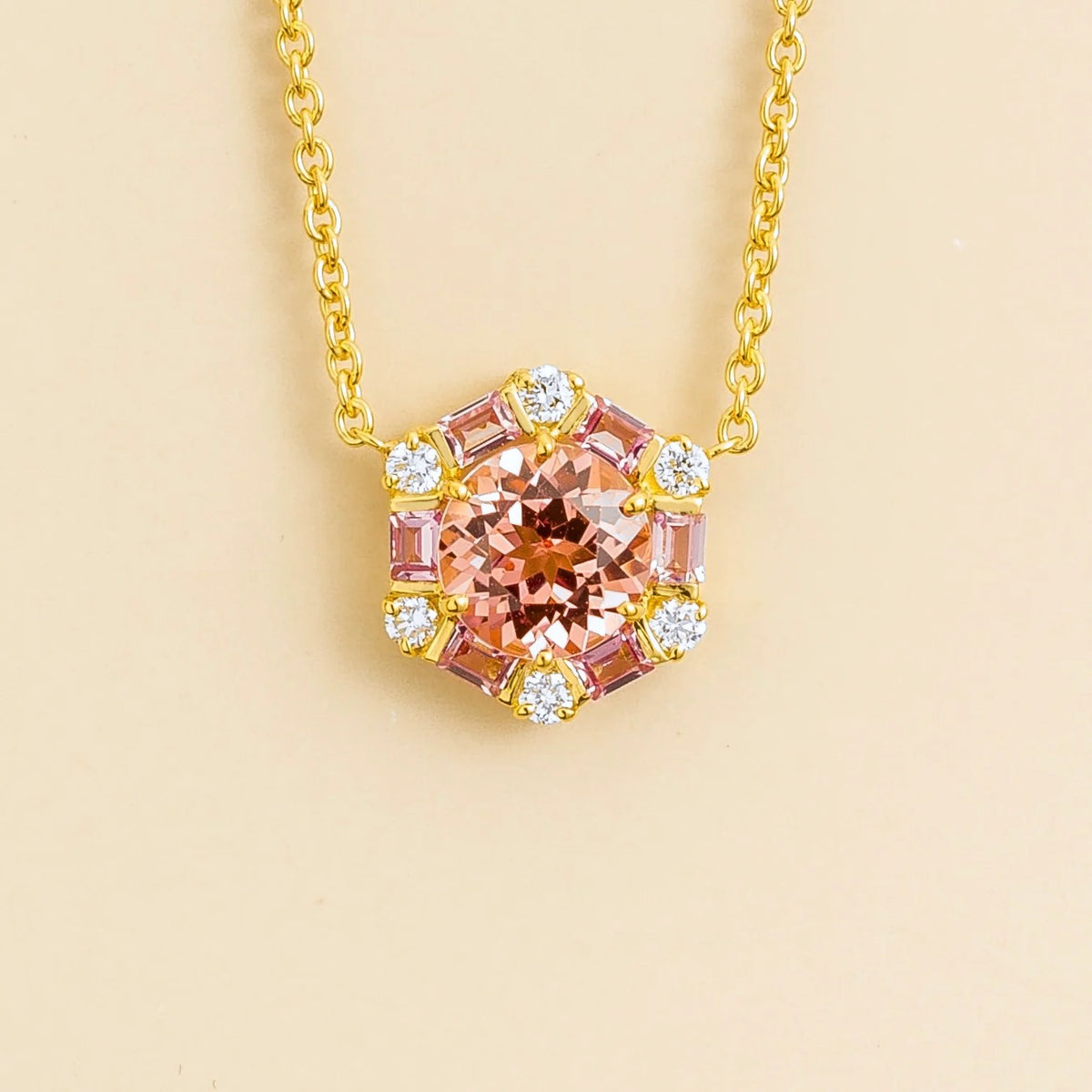 Melba padparadscha sapphire, pink sapphire & diamond halo hexagon pendant necklace in gold
