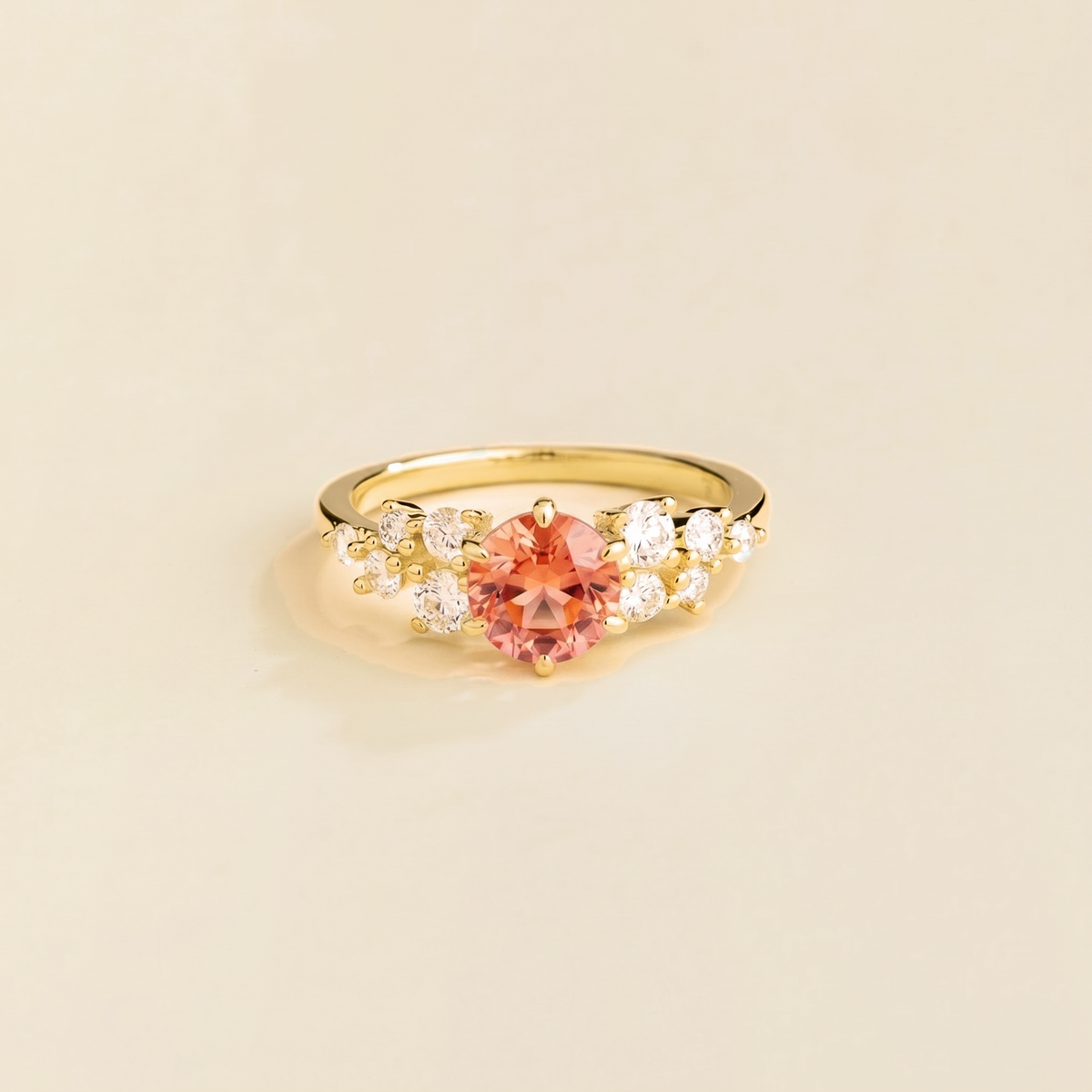 Floret round lab-grown padparadscha sapphire and diamond cluster ring in gold – front | Juvetti London