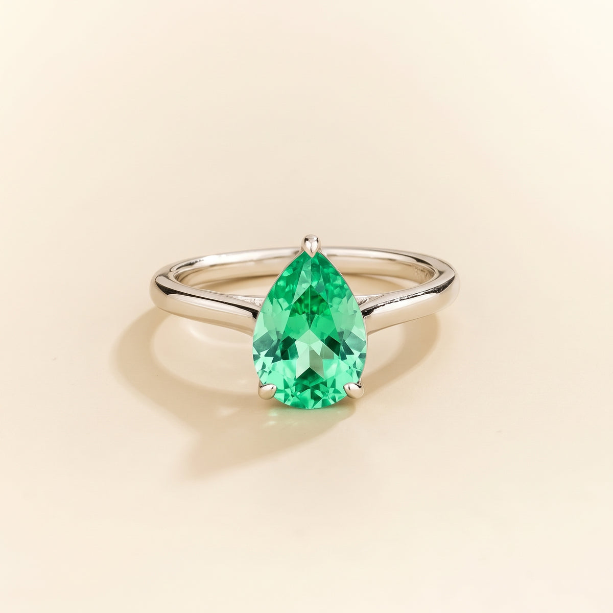 Pandal Pear Shape Green Sapphire Cathedral Solitaire Ring in White Gold, front view