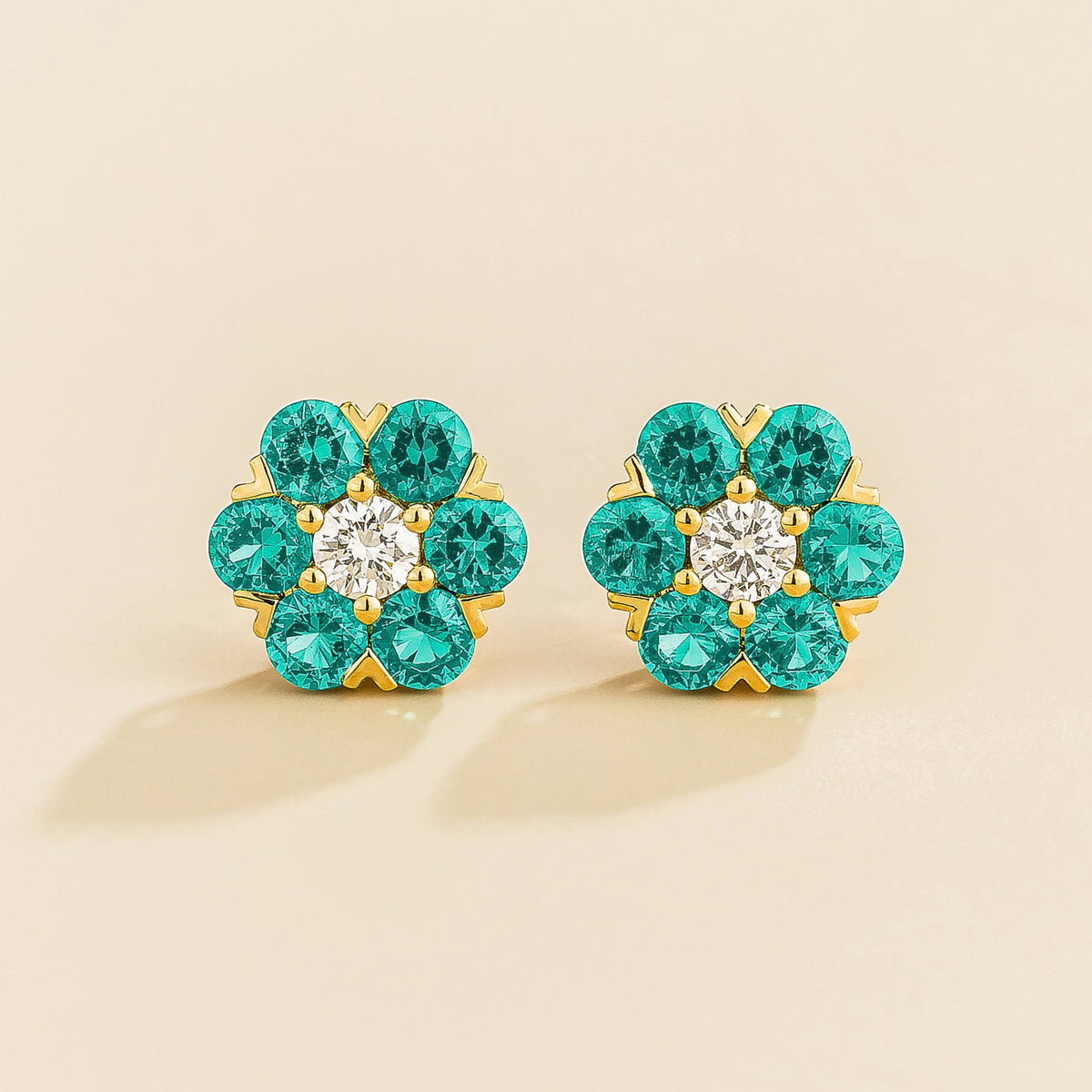 Lab-grown Paraiba and diamond flower stud earrings in gold | Juvetti London