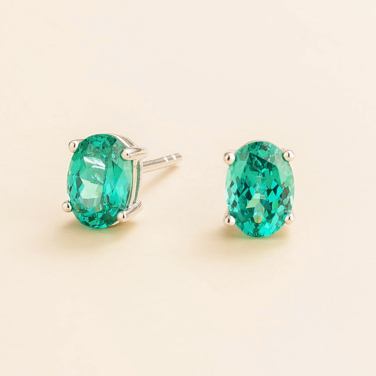 Oval paraiba solitaire stud gemstones earrings set in white gold