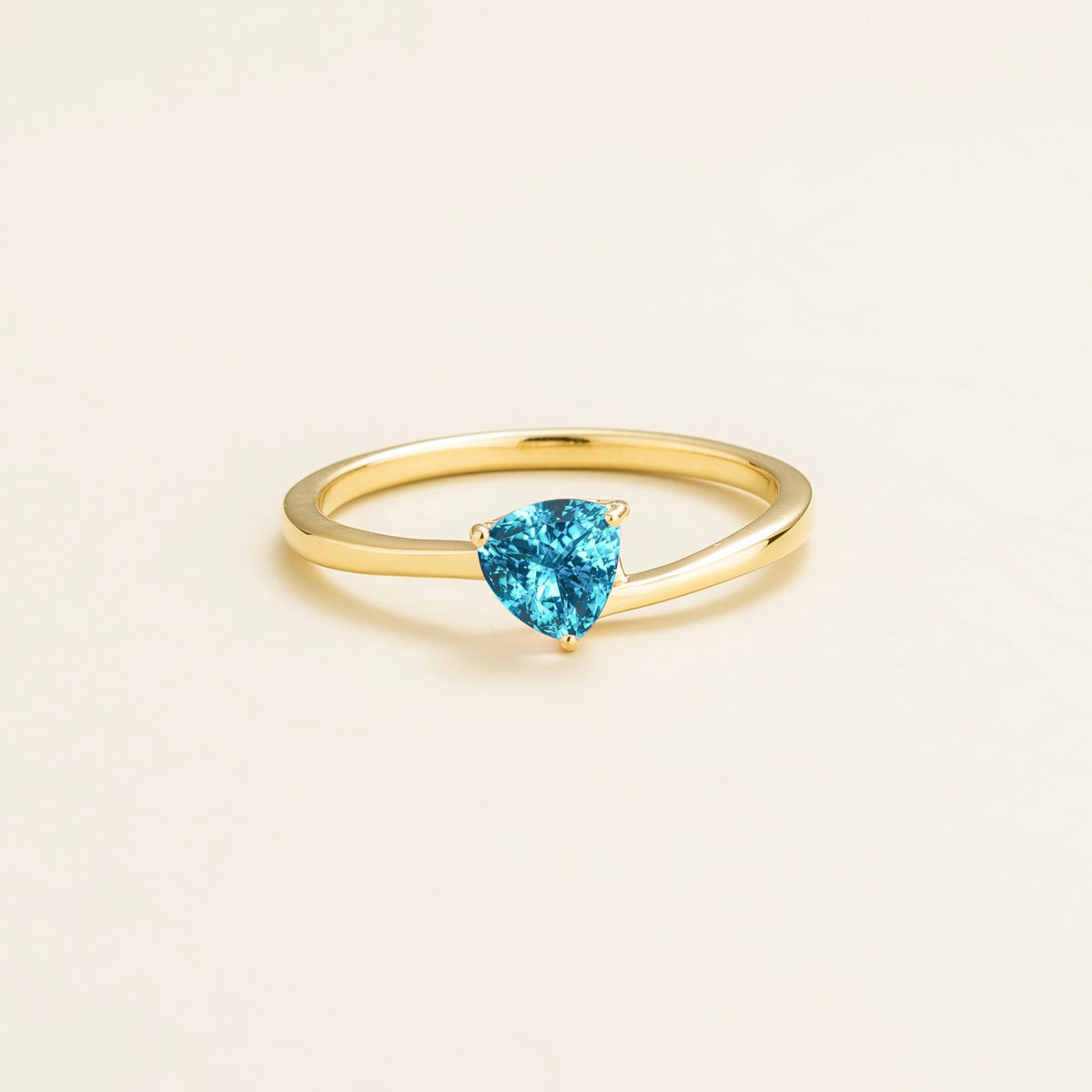 Trillion paraiba sapphire solitaire ring in gold