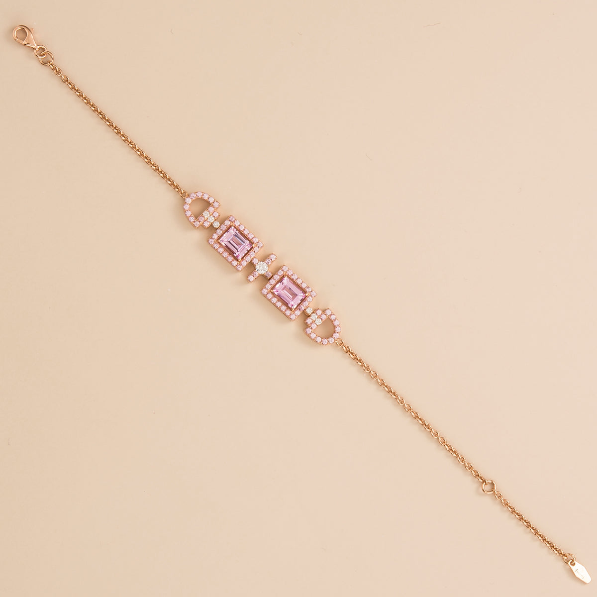 Ciceris pink sapphire Art Deco halo bracelet in rose gold, two emerald-cut lab-grown sapphires with diamonds, full length | Juvetti London