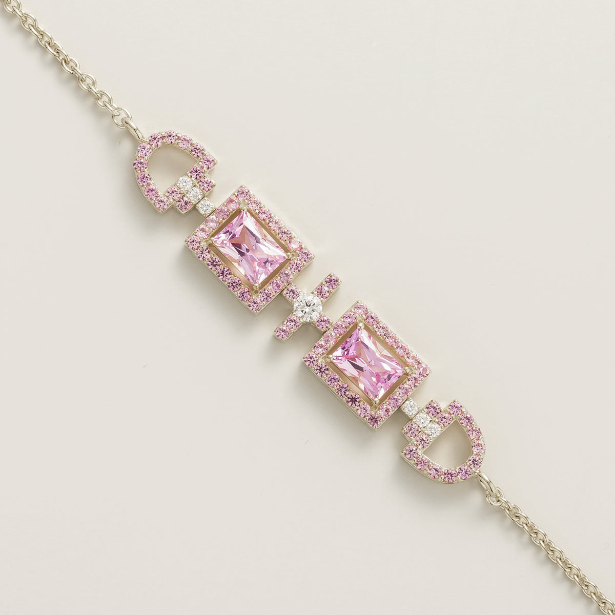 Ciceris pink sapphire Art Deco halo bracelet in white gold, two emerald-cut lab-grown sapphires with diamonds, close-up | Juvetti London