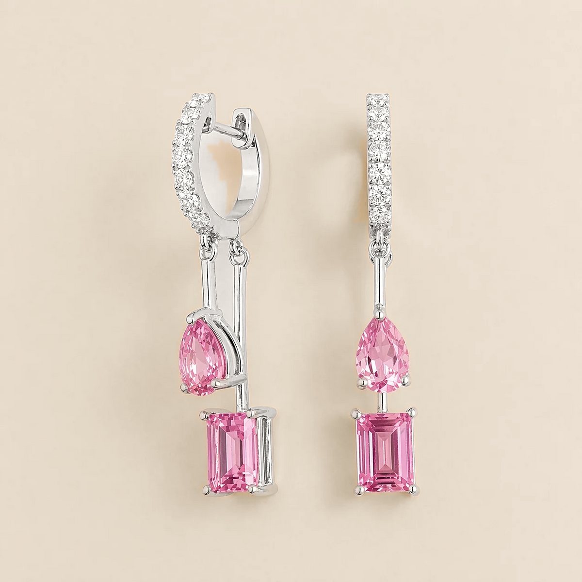 Faire pink sapphire huggie drop earrings in white gold, pear and baguette-cut lab-grown pink sapphires with diamond pavé, front view | Juvetti London