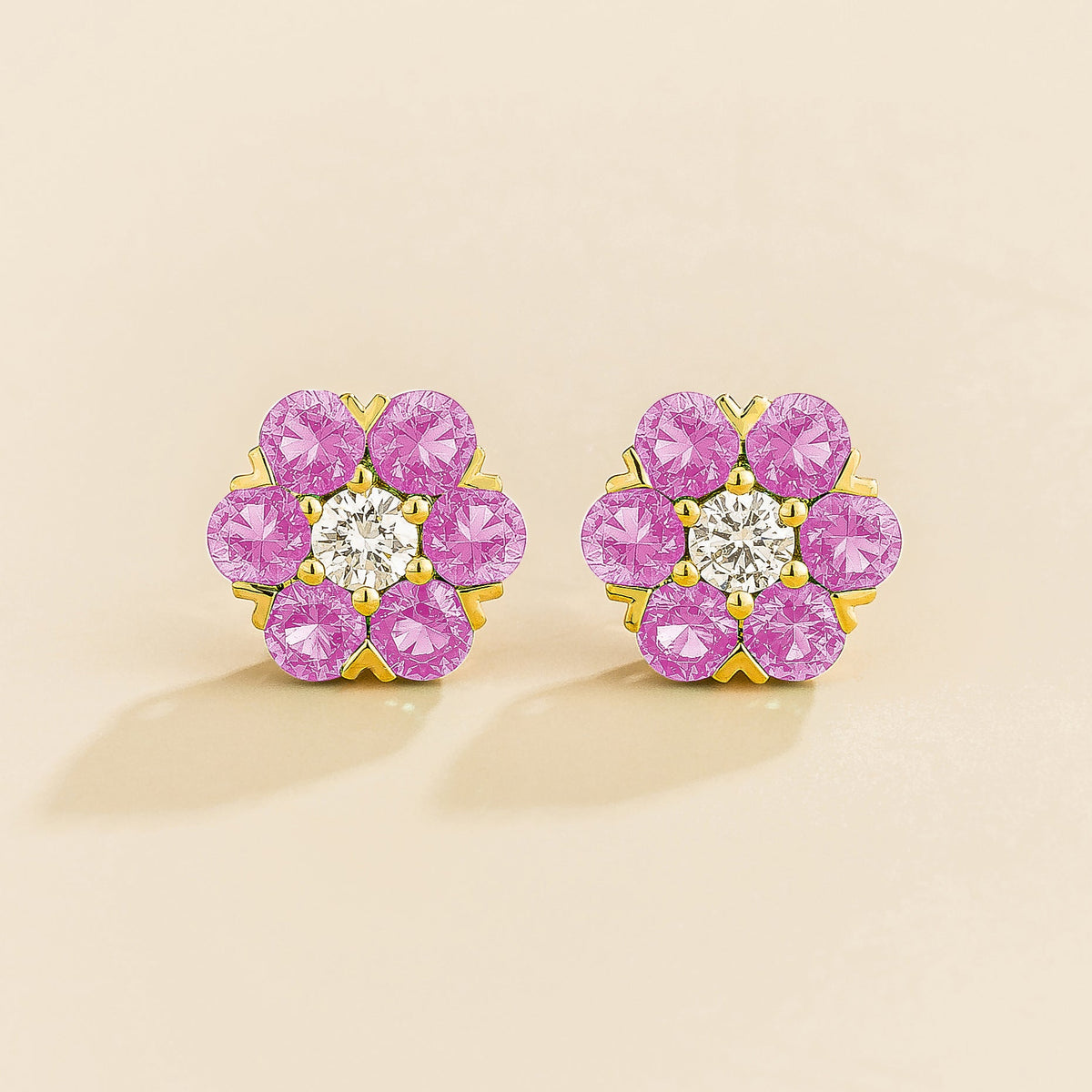 Cinq earrings in gold set with Diamonds and Pink Sapphires.