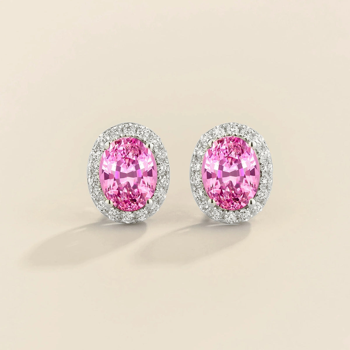 Lab-grown pink sapphire and diamond oval halo stud earrings in white gold – front view | Mina by Juvetti