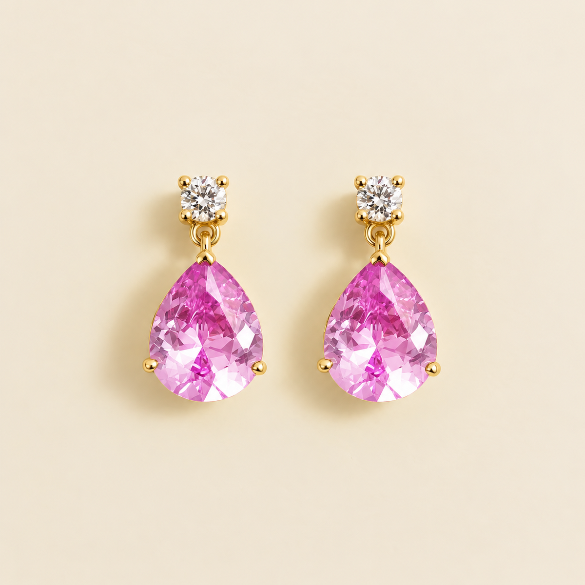 Medium lab-grown pink sapphire and diamond pear drop earrings in gold – front view | Pisa by Juvetti