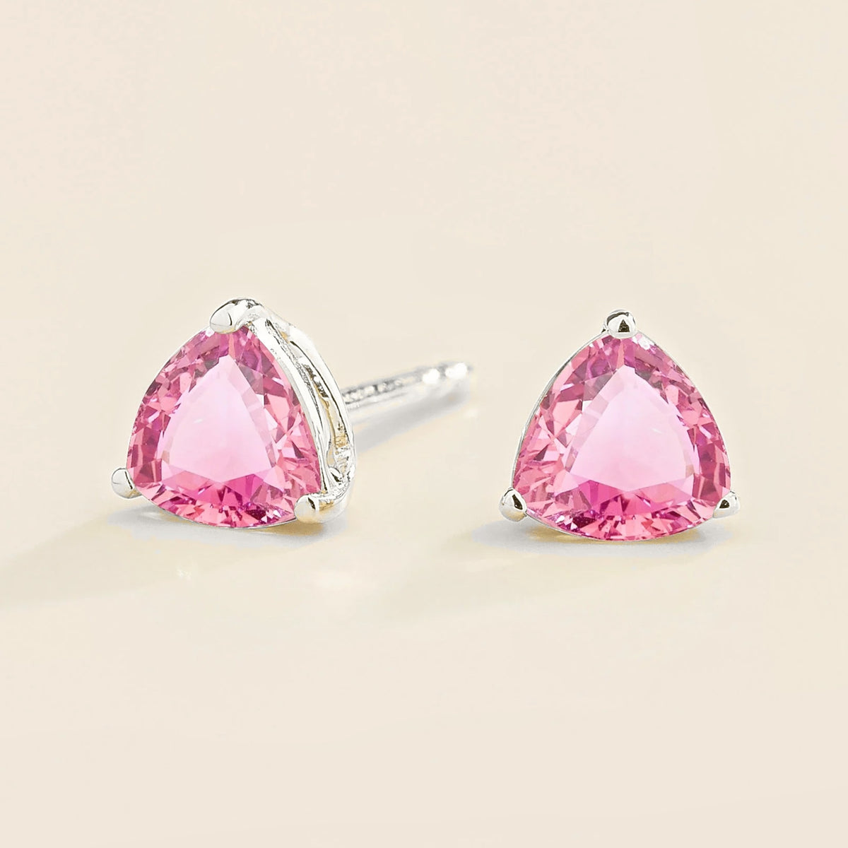 Trillion Pink Sapphire Solitaire Stud Earrings in White Gold – angle view