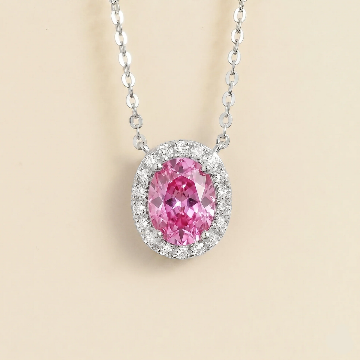Lab-grown pink sapphire and diamond oval halo necklace in white gold – front view | Mina by Juvetti