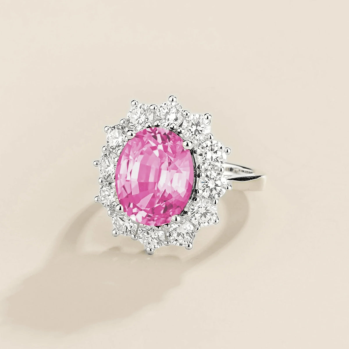 Oda Pink Sapphire Oval & Diamond Halo Ring – angle view