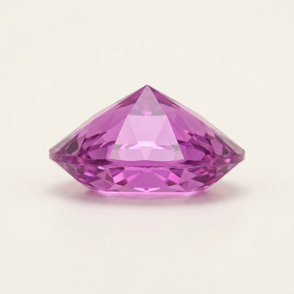 Pinkish-purple lab-grown sapphire, oval cut, side view