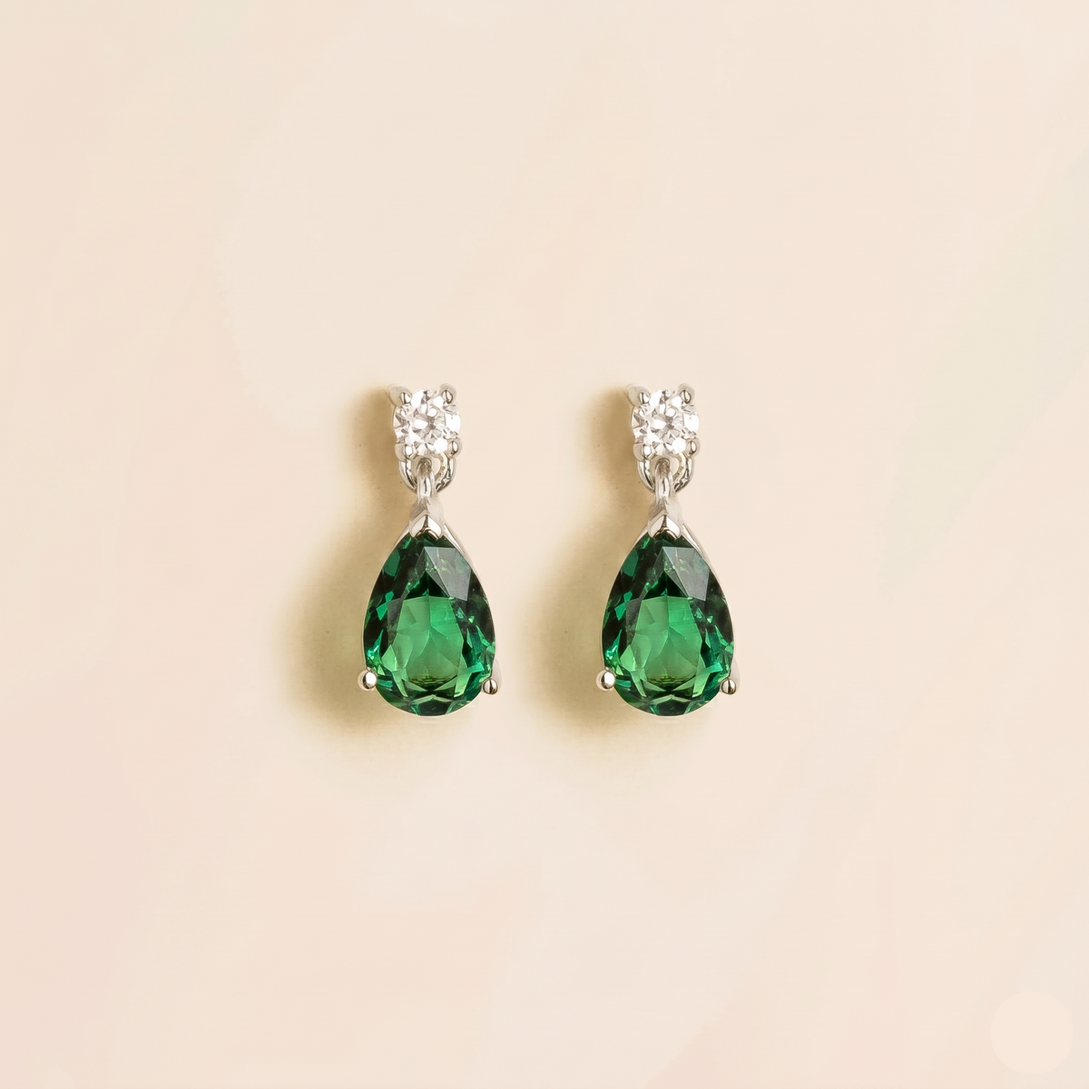 Pear-cut lab-grown emerald and diamond drop earrings, Pisa design in white gold | Juvetti London