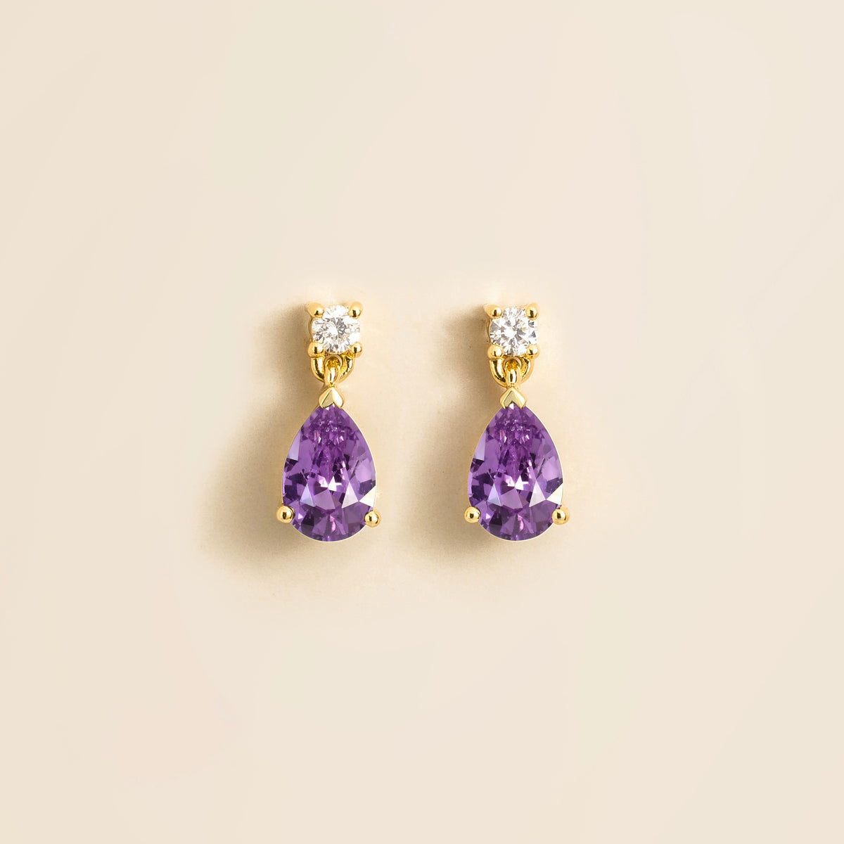 Lab-grown purple sapphire and diamond pear drop earrings in gold – front view | Pisa by Juvetti