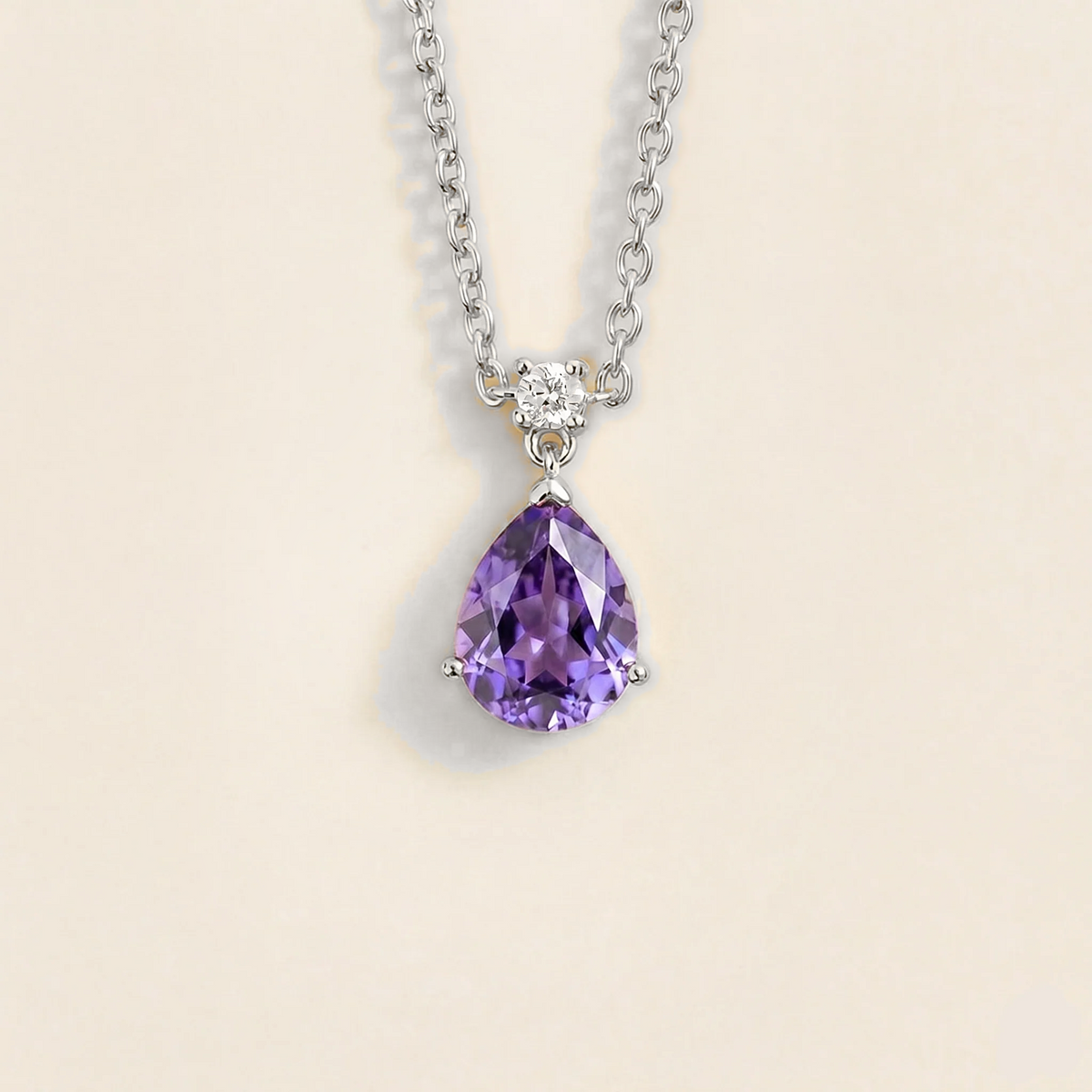 Lab-grown purple sapphire and diamond pear drop pendant necklace in white gold, medium – front view | Pisa by Juvetti