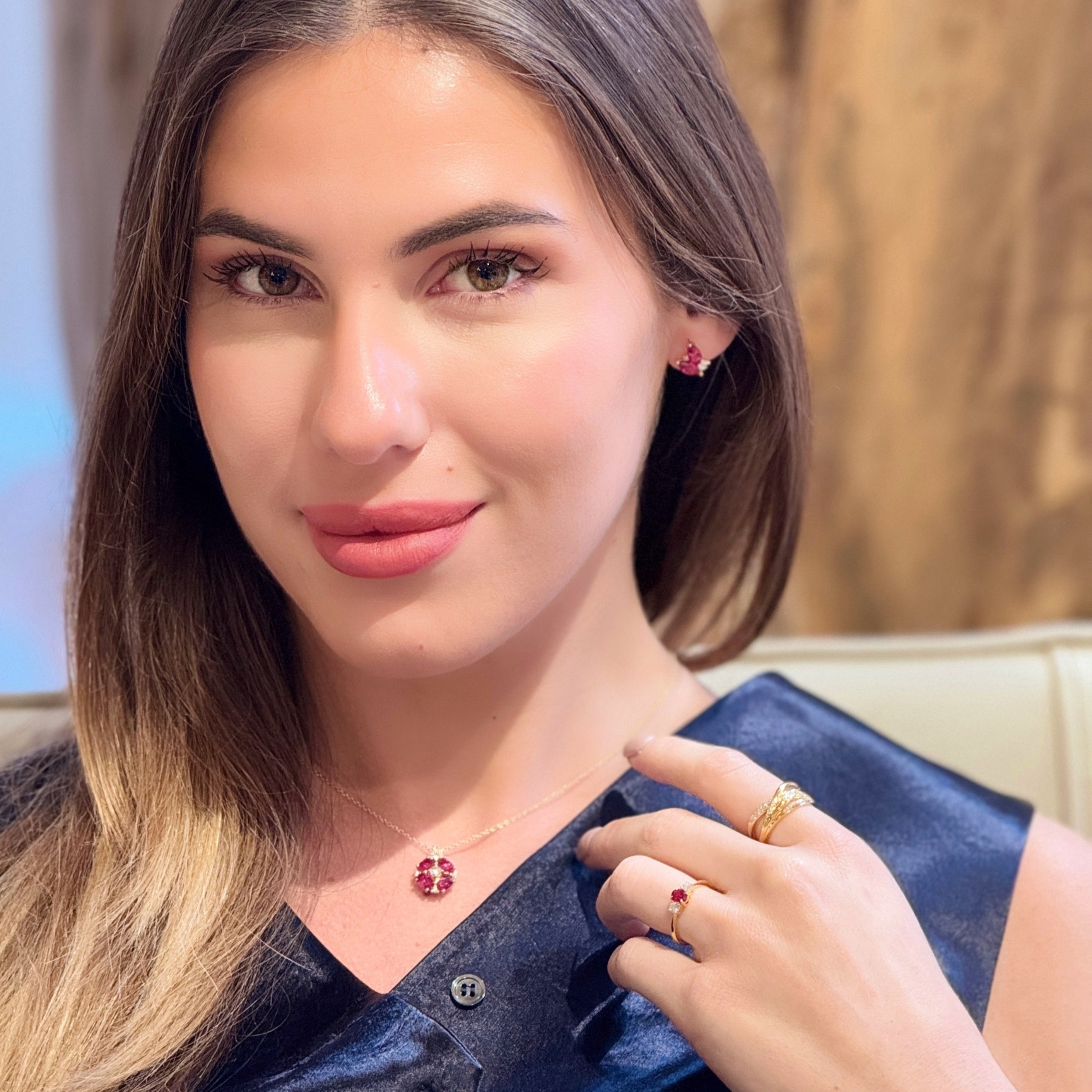 Matching gold gemstone earrings styled with the Boble purple sapphire ring, Juvetti London