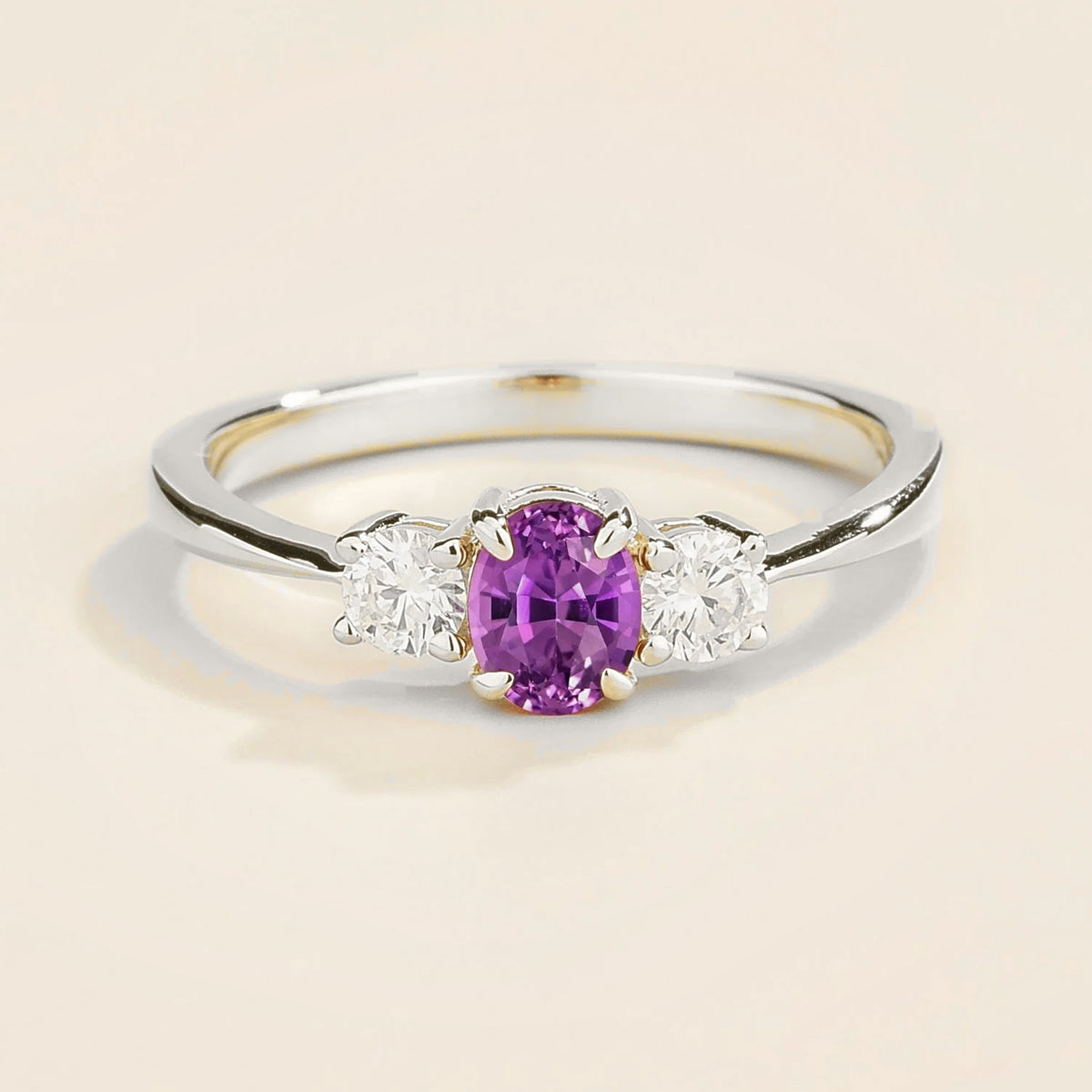 Front view of the Boble Purple Sapphire Oval & Diamond Three-Stone Ring in White Gold, handcrafted by Juvetti London