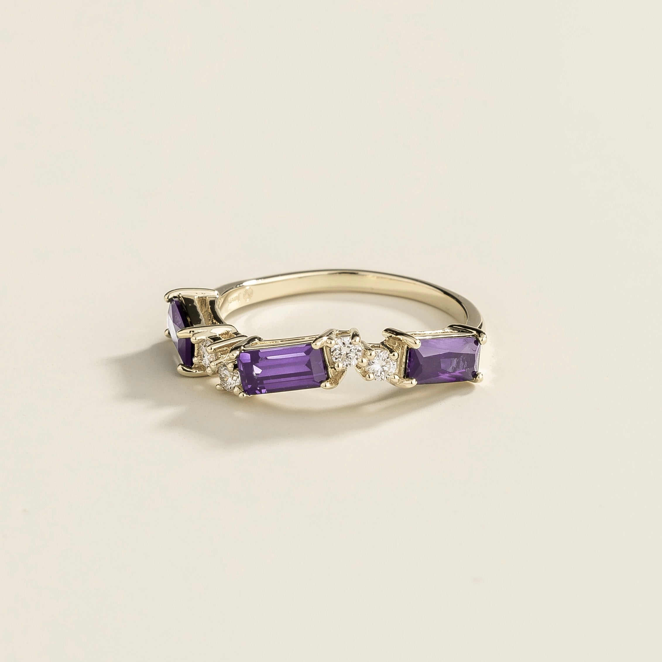 Forma Purple Sapphire & Diamond Baguette Cut Three-Stone White Gold Ring, side angle