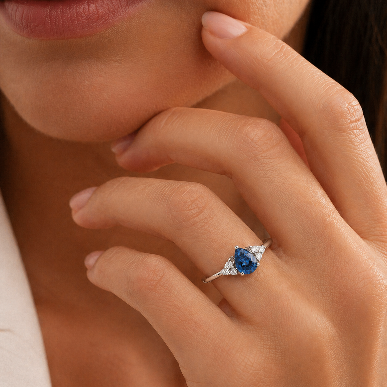 Model wearing the Pisa Purple Sapphire & Diamond Pear Cut Ring in Gold