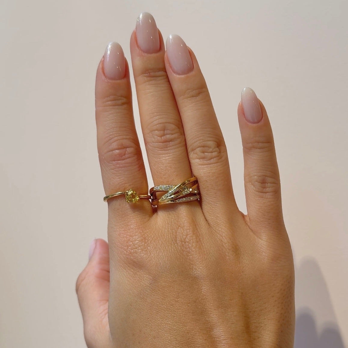 The Trillion solitaire ring design shown in the yellow sapphire colourway, gold